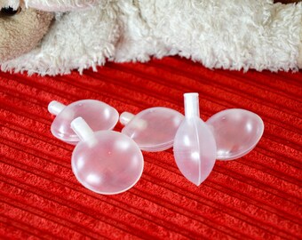 POUET POUET 27 * 37mm inserted into a toy or stuffed animal