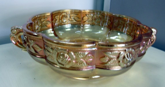 Peach Carnival Glass serving bowl with handles