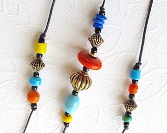 Beaded Wind Chime: Garden Chime with Multicolor Opaque Glass Beads. Fiesta Colors. Orange. Turquoise. Jadite Green. Yellow. Blue. Brass Bell