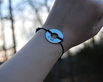 Hand-stamped, customizable washer bracelet