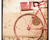 vintage pink bike with basket