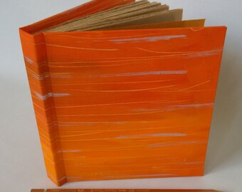small hand bound recycled brown paper journal