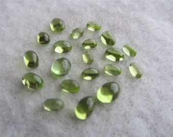 Peridot Cabochons 7x5 oval lot of 10 stones