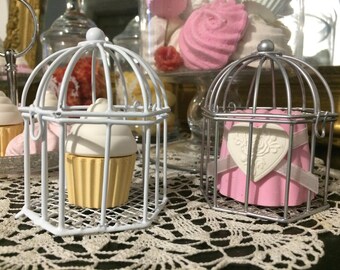 with cake made of cast metal cage, gluttony