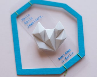 White minimalist geometric triangle brooch