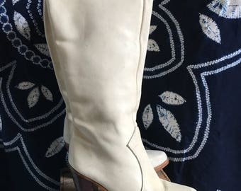 Vintage Tall Zodiac high heel cowboy boots. Size 5.5. Ivory with wood heel.