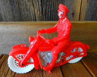 Vintage Auburn Rubber Company Police Cop riding Motorcycle