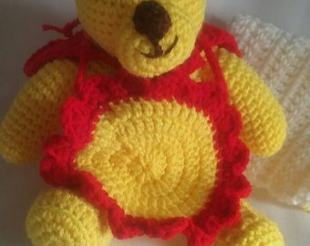 Super teddy with red cape, ball and burp cloth