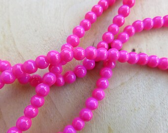 Set of 50 4 mm painted glass beads dyed: Fuchsia pink.