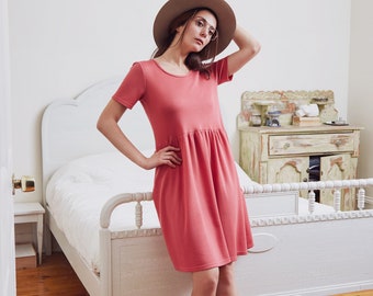 Short Sleeves Boat neck dress with slit opening at the back. Raspberry Pink or Gold Tencel Piqué.