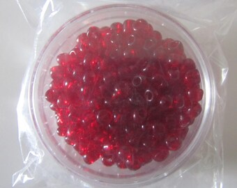 box of 20 g of Red/Burgundy color round seed beads