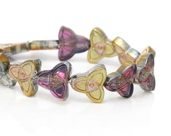 A set of 10 glass purple and yellow gold Celtic knot beads.