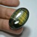 Blue Tiger eye cabochon.oval.32x20x7mm..41cts.A#328