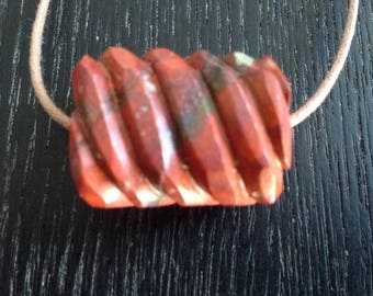 Hand Carved Cuprite Bead.