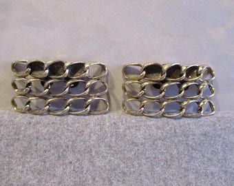 Pair of "Musi" brass shoe buckles