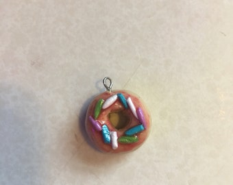 Polymer clay doughut with pink icing and sprinkles!