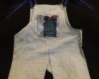 Blue gingham romper with patchwork pocket