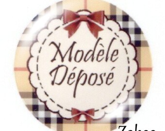 1 30mm glass cabochon, I am registered brown tone...