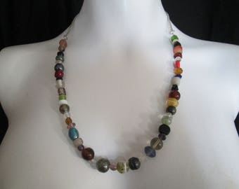 Artist created lampwork glass beaded necklace with silver chain back