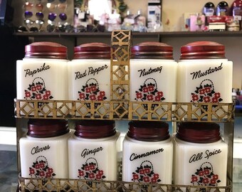 Vintage Tipp City milk glass spice set of 8 with original paint on metal rack red flowers pattern