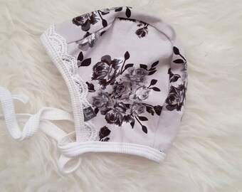 Black white and grey flower pilot hat by Little Lapsi. Baby hat with ties. Lace