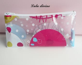 Clear waxed canvas with colorful polka dots, white zip clutch