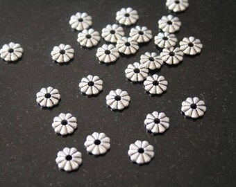 40 in antique silver rondelle spacer. (ref:0073).