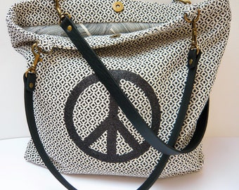 Black and white patterned peace tote bag