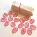 Vintage Cherry Brand pink glass cabochons blush 17 oval dome Japan vintage pink cream swirl 20x15 mm ovals bevel edge back Made in Japan
