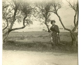 Vintage photo woman in landscape 1910