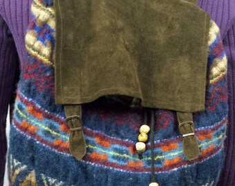 C114 backback made from a felted recycled wool sweater, suede flap and straps, lined