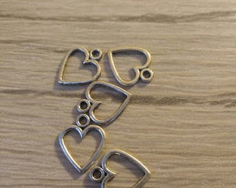 set of five heart shaped pendants