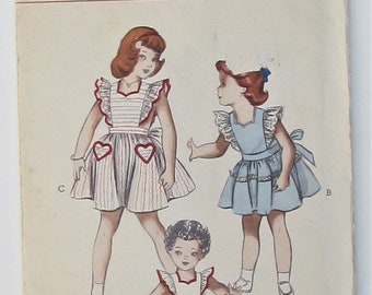 Pinafore With Ruffled Edge Back Button Closure Dirndlish Skirt Girl's Size 2 Used Vintage Sewing Pattern Butterick 5749