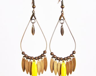 Dangle drop earrings and lemon yellow enameled shuttle