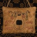 Primitive Stitchery Pillow/Ornament - Merry Moose with String of Lights Tangled in Antlers