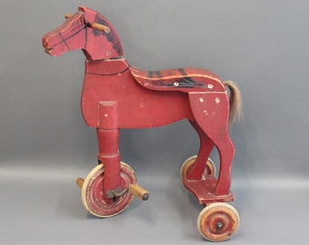 Antique three wheeled bike-horse