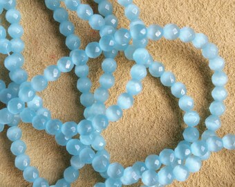 4mm faceted round light aqua cats eye glass beads