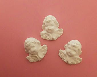 hand made plaster angels, sold individually. 3 × 3 cm