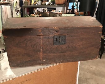 Vintage wood trunk with dome top light wood