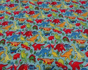 Patterns of sky blue dinosaur print cotton fabric