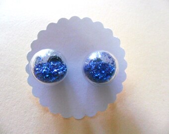 Earrings made of glass balls with blue glitter