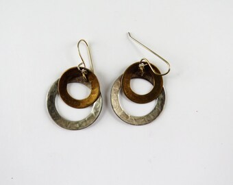 Marjorie Baer MB SF vintage brutalist modernist mixed metal hammered silver tone brass gold tone dangle two 2 circle flare out when worn