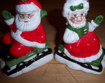 Vintage Lefton Japan Ceramic Christmas Salt and Pepper Shaker Santa and Mrs Claus Set 10443 on Sleigh