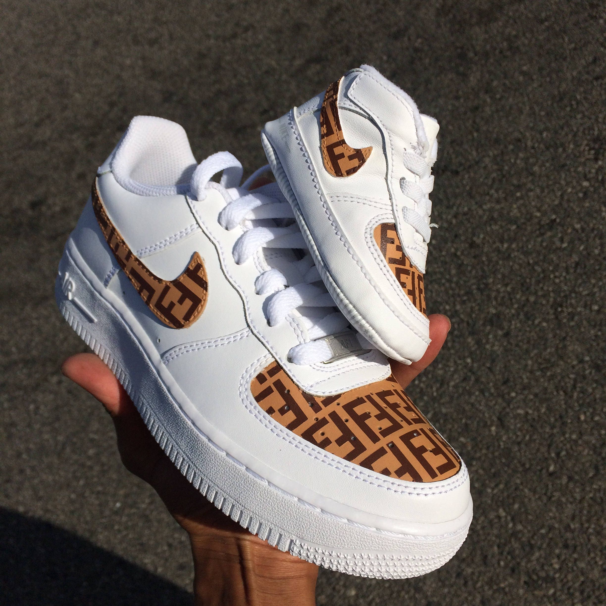 lv nike swoosh