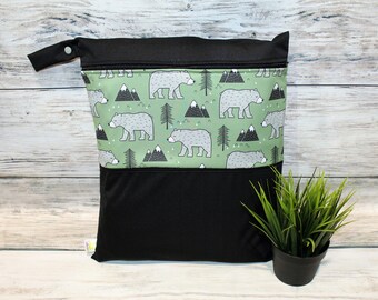 The bear carrying bag