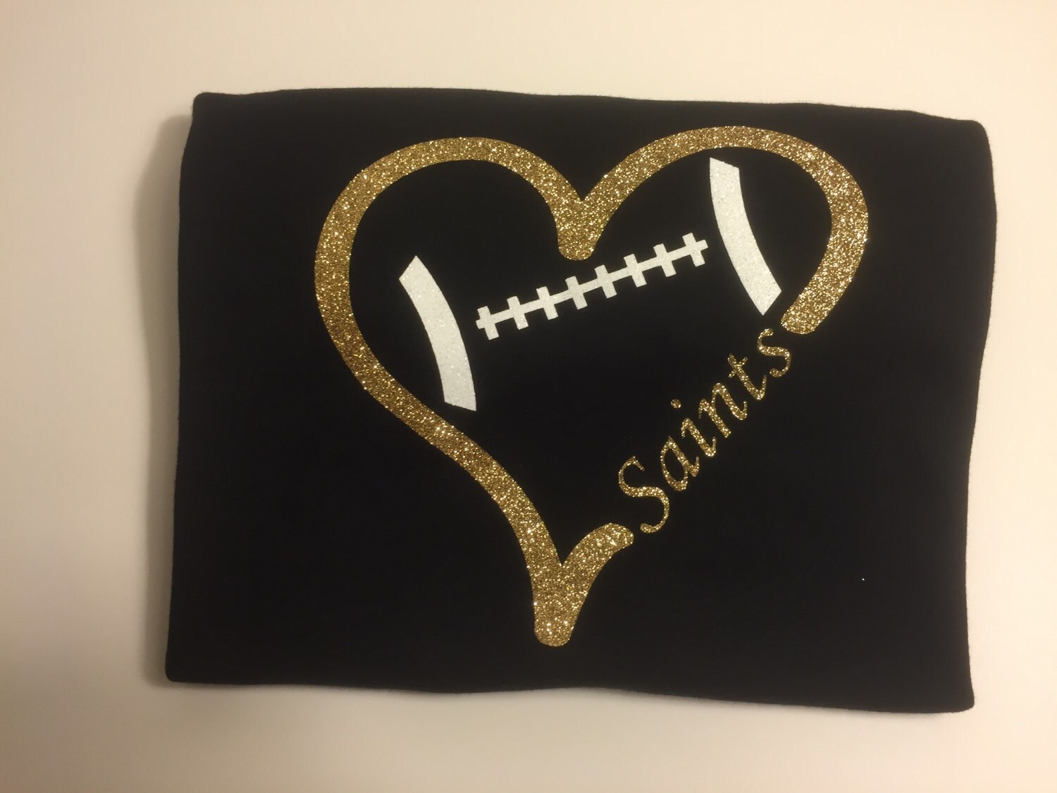 children s saints football heart t shirt black and gold saint t shirt design