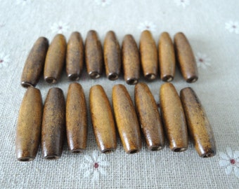 30 Pcs 28X9mm Oval Wood Bead Brown (W730)