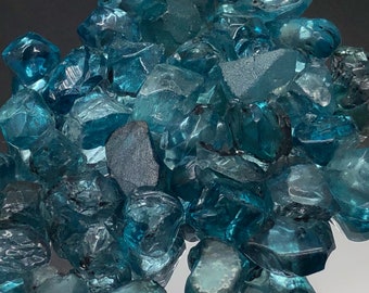 Clean, top color, blue, Cambodian Zircon faceting rough. 8 dollars per carat!