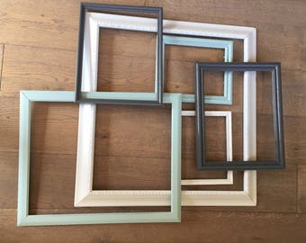Six empty frame collage. Largest measures 28.25x27.25