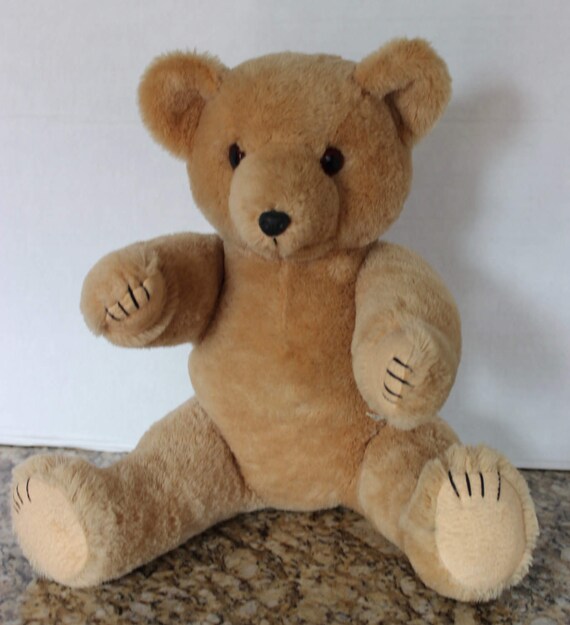 teddy bear with embroidered eyes